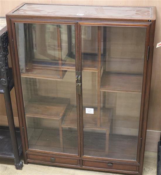 A Chinese hardwood table top cabinet, H.89cm